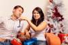  young couple exchanging christmas gifts (series)