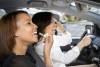 Women friends in car