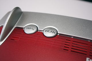 WPS und WLAN Button bei einer Fritz!Box